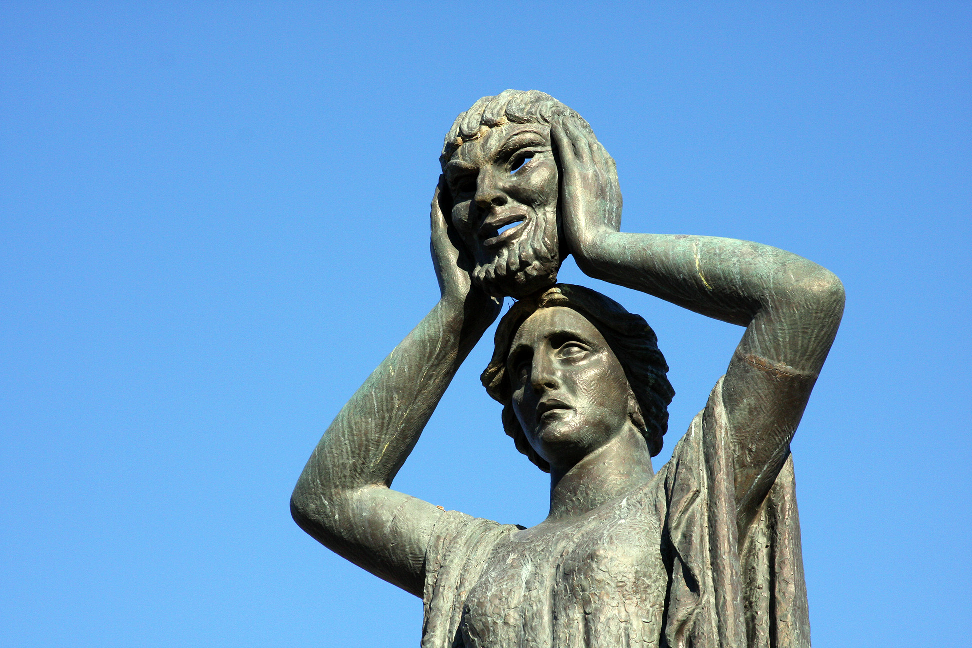Statue against blight blue sky