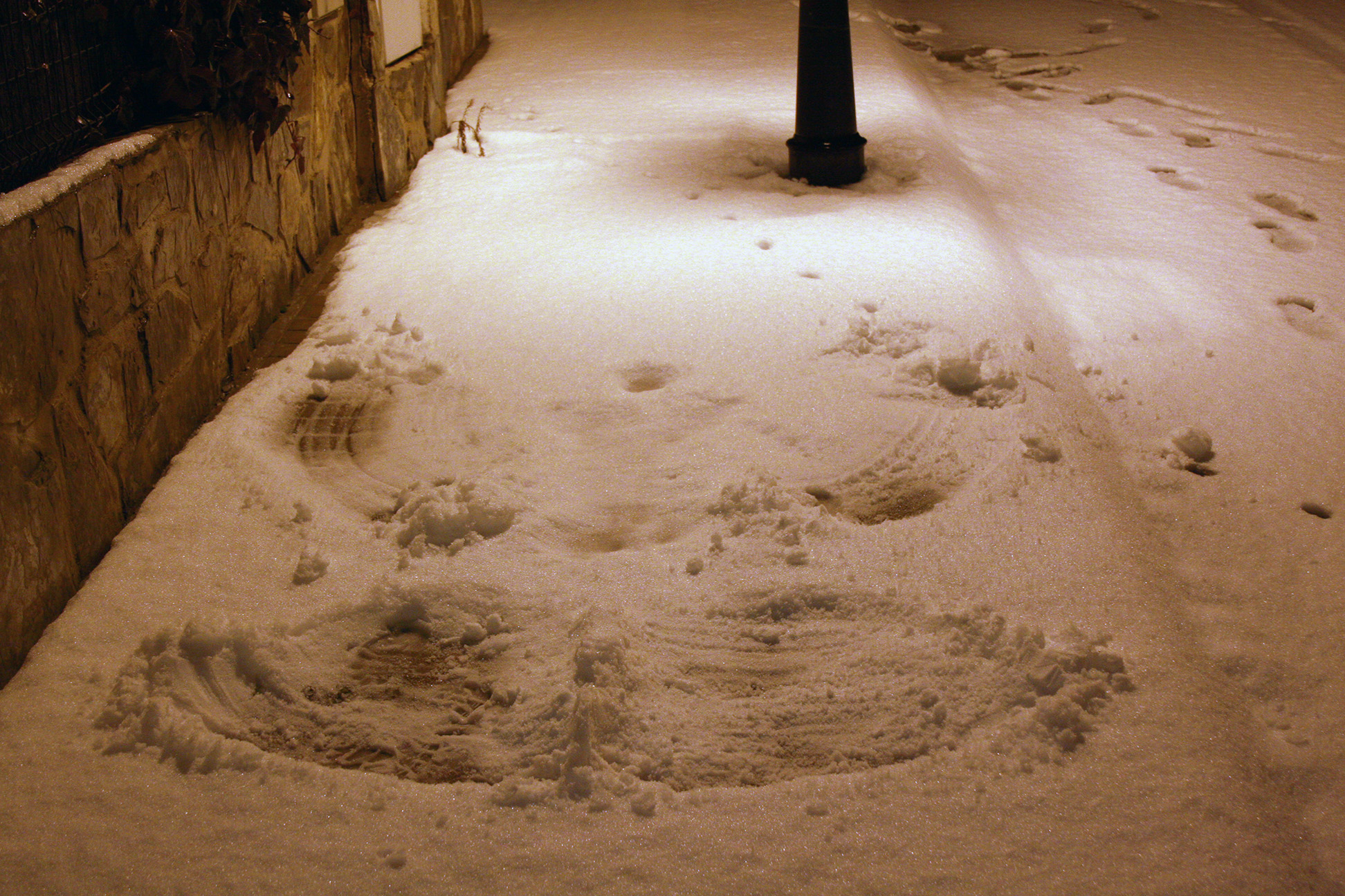Snow angel on the pavement